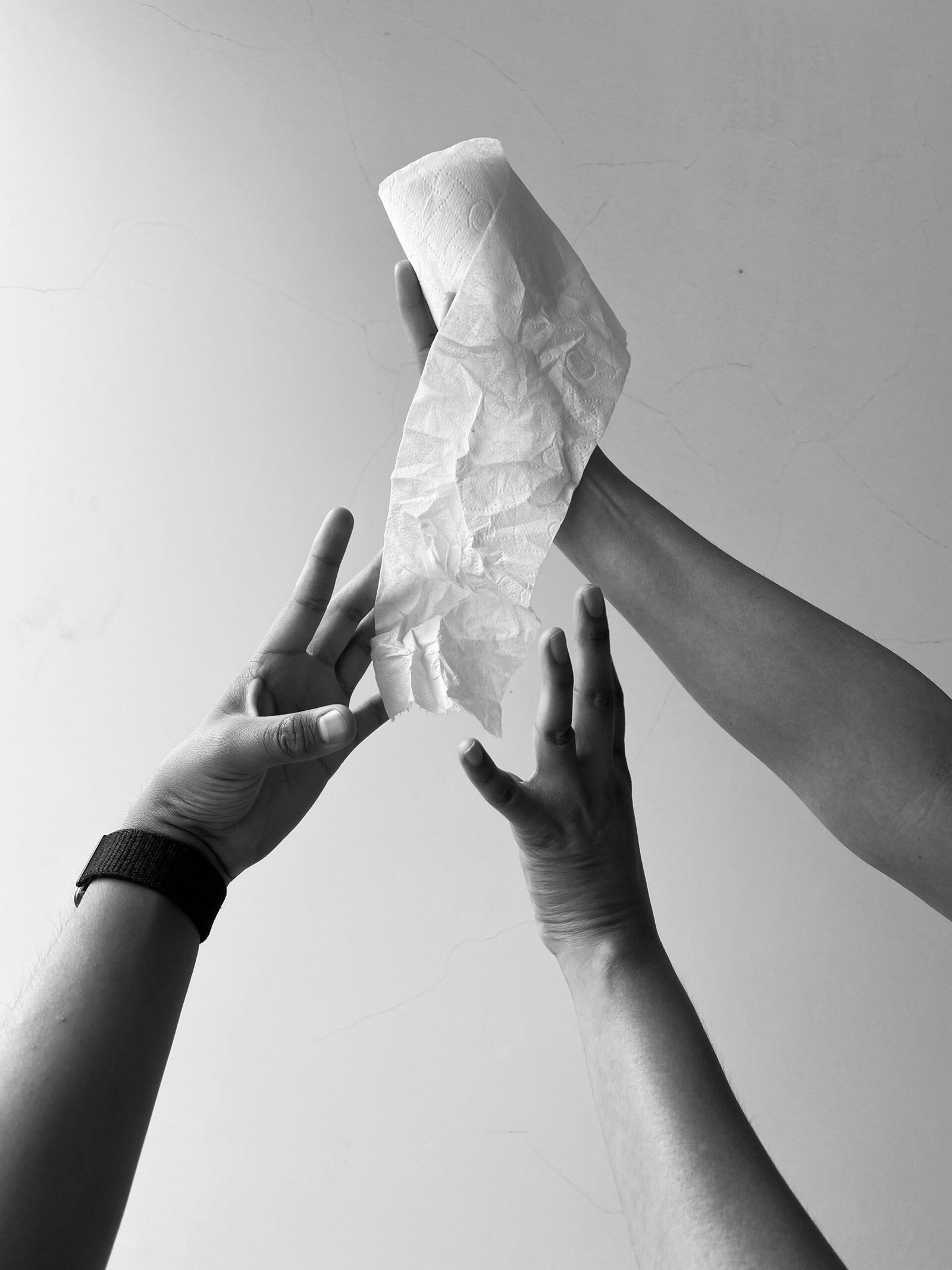 person holding white tissue paper